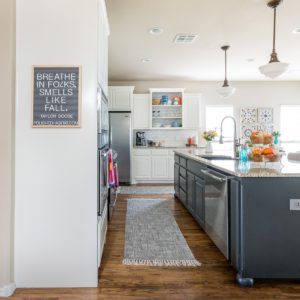 White Dove Kitchen Cabinets with black island